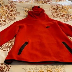 Red Nike hoodie sweatshirt.